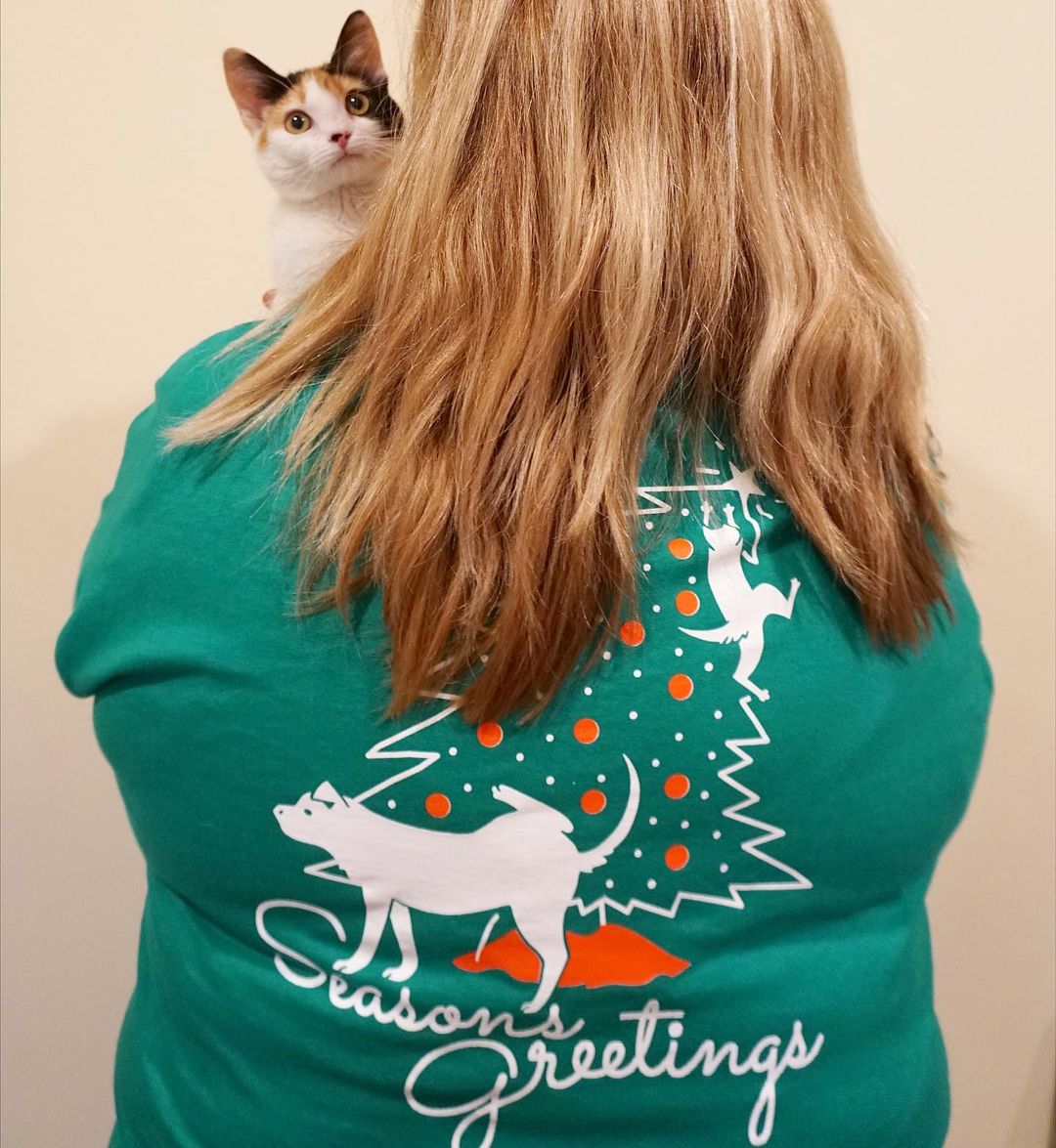 Laura CAN NOT contain her excitement any longer! Fresh off the press, it’s our limited edition Seasons Greetings t-shirts! We only have a limited quantity so get them fast, we will be selling them only in person at our office location. You’ll want to grab one soon so you can wear it all season long! 
Sizes range from: S-2XL
Price: $25.00