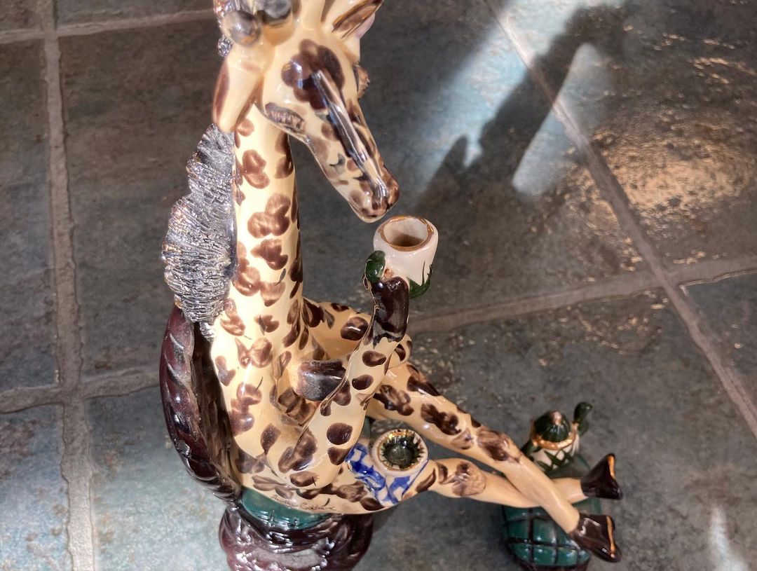 Now at SpayMart: the reclining, tea-drinking giraffe you’ve been missing from your life. If you really need a reason other than Because - all proceeds go toward SpayMart’s feline rescue mission ⚜️ <a target='_blank' href='https://www.instagram.com/explore/tags/rumorsaretrue/'>#rumorsaretrue</a> <a target='_blank' href='https://www.instagram.com/explore/tags/giraffe/'>#giraffe</a> <a target='_blank' href='https://www.instagram.com/explore/tags/nola/'>#nola</a> <a target='_blank' href='https://www.instagram.com/explore/tags/teadrinkers/'>#teadrinkers</a> <a target='_blank' href='https://www.instagram.com/explore/tags/curiosities/'>#curiosities</a> <a target='_blank' href='https://www.instagram.com/explore/tags/kitsch/'>#kitsch</a> <a target='_blank' href='https://www.instagram.com/explore/tags/kitschmas/'>#kitschmas</a>